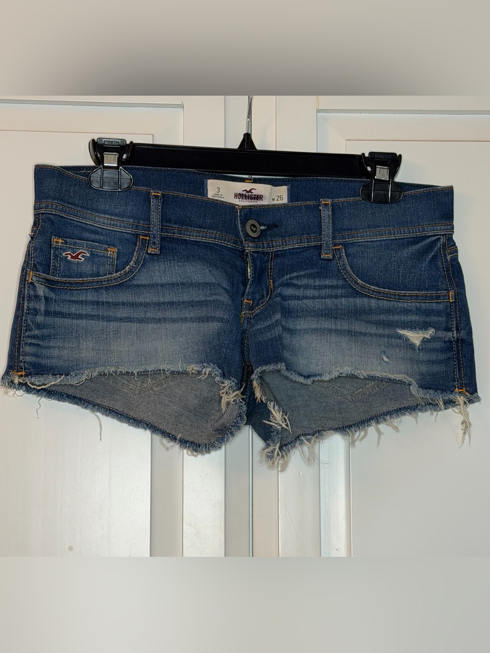 Hollister Faded Blue Frayed Denim Shorties